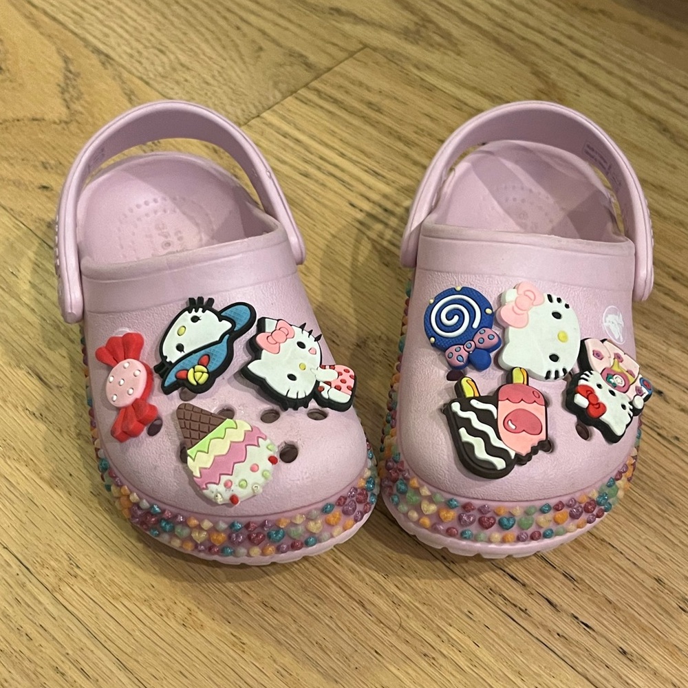 Pink Crocs with Rainbow Gems and Hello Kitty Jibbitz
